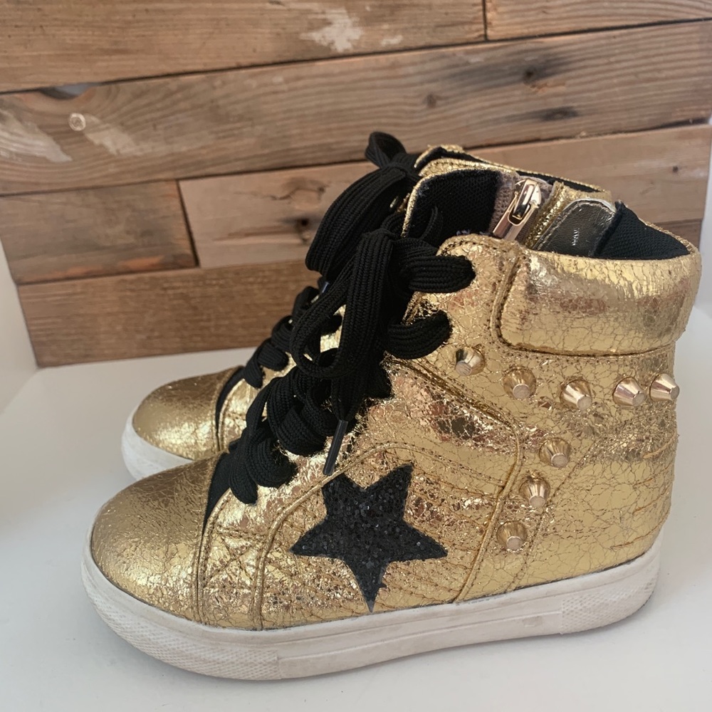 High top gold sneakers